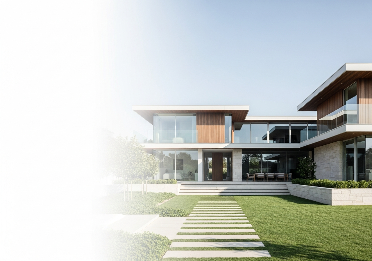 A modern luxury new-build home at dusk with large glass windows